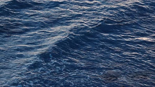 Blue Crystal Clear Water Perfect Seascape in Slow Motion Sea Wave Low Angle View Ocean Surface Deep