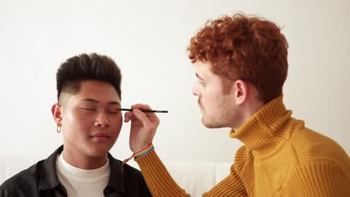 Makeup Application Between Two People in Home