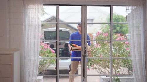 Delivery Driver Brings Fresh Produce to Home