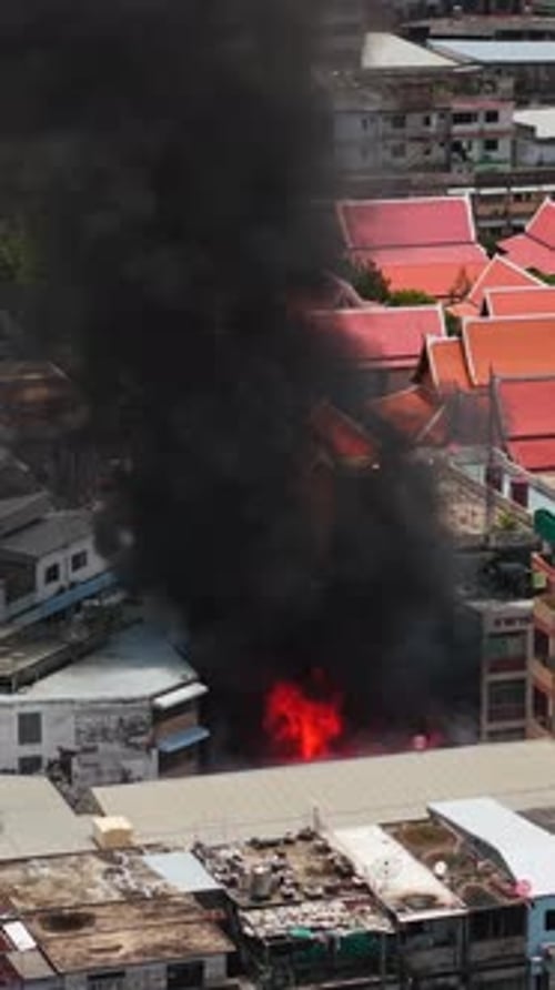 The Khaosan Skyline in Bangkok Thailand is Dyed Black By Smoke From a Building Fire