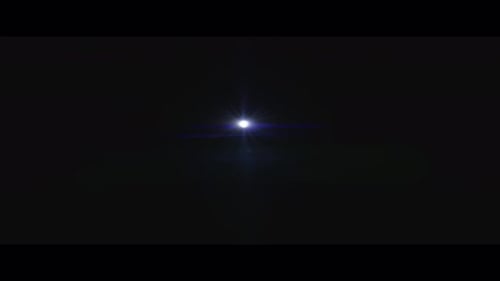 Lucent Panorama Collection: A blue lens flare moving from the top side to the center over a black ba