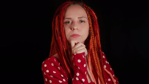 Woman Staring Intently with a Pensive Expression