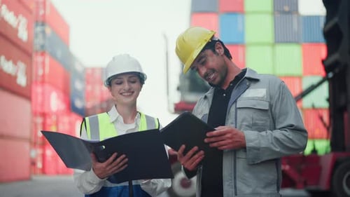 Shipping Employees Discussing Work at Container Site