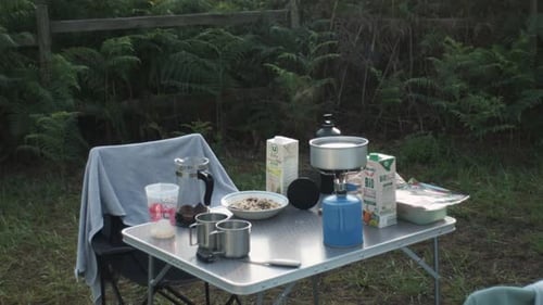 Isolated Campsite Kitchen, Water Boiling On Stove For Coffee.