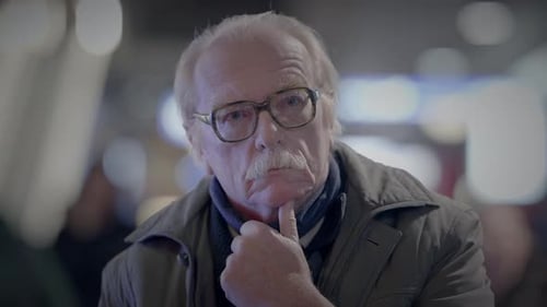 Elderly Homeless Man Suffering From Poverty Looking for Help at Train Station