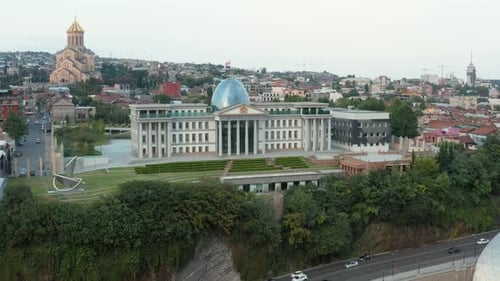 Rotating aerial view of Ceremonial Palace of Georgia, Avlabari Presidential Residence. Forwards came