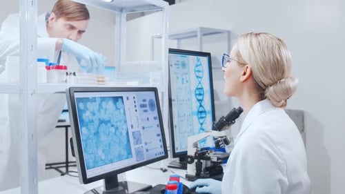 Scientists Working in Modern Medical Research Laboratory