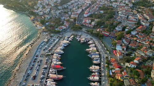 Aerial view of harbor and boats along coastline, Turkey.