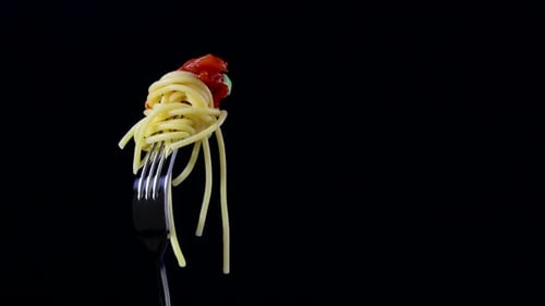 Spaghetti, pasta on black background