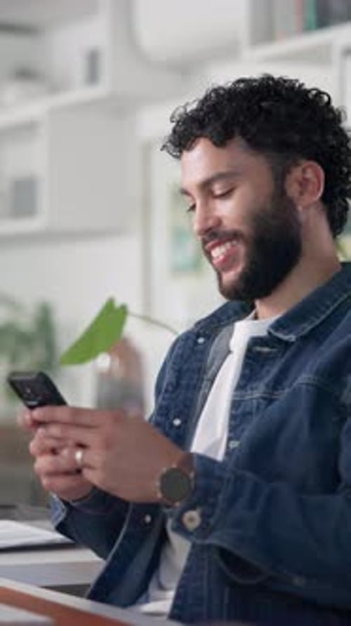 Business, man and smile with phone in office for email notification, typing message