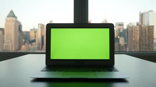 Computer Screen Isolated on GreenScreen Background Chroma Key in City Office