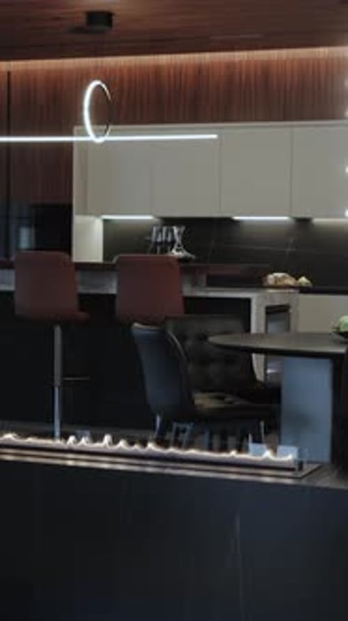 An Elegant and Modern Kitchen Featuring Minimalist Flames for a Stylish Cooking Space Vertical Video