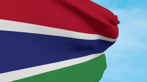 Gambia National Flag Waving in Realistic Blue Sky Background