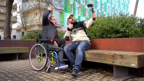 Content Creator Filming a Disabled Friend with Gimbal