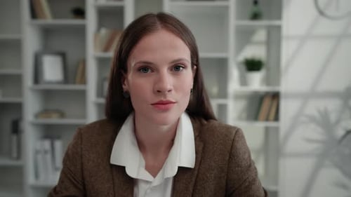 Portrait of the Charming Young Business Lady at Home Office Caucasian Girl Sitting at Table in