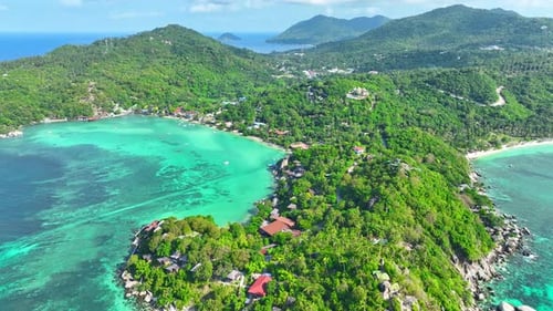 Drone aerial view captures stunning island. 4K.