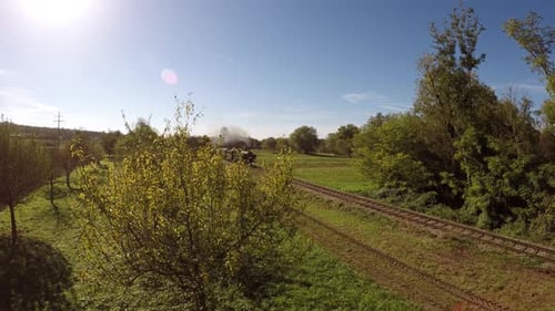 Industrial Steam Engine Locomotive Train Crossing Railroad Tracks