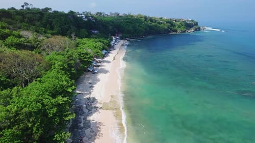 Tropical Beach with Turquoise Ocean Drone View of Sandy Coastline in Bali