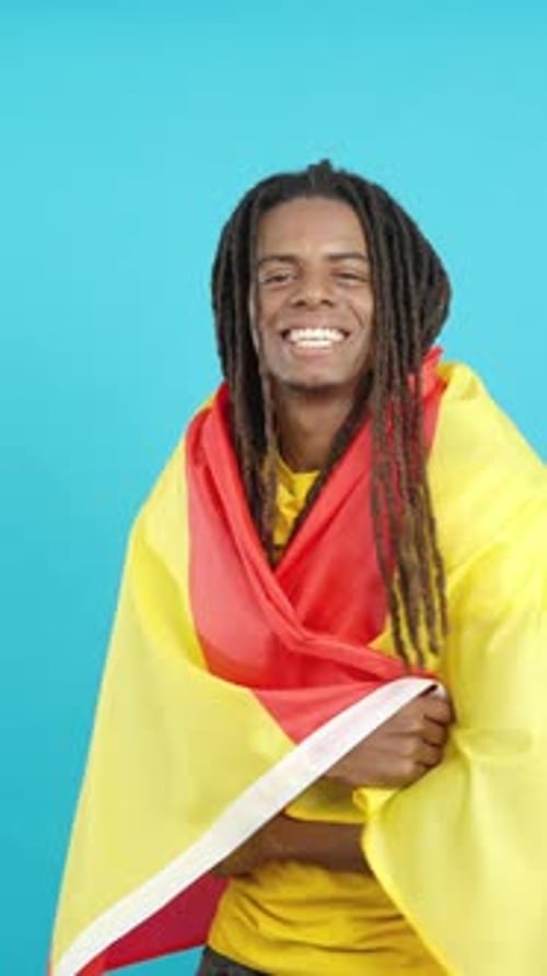 Happy Man Smiling Holding a Flag