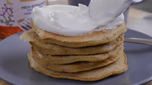 Pancakes with Sweet Topping on Grey Plate