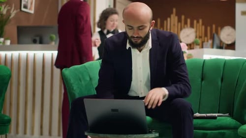 Entrepreneur in Suit Taking Notes
