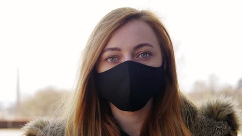 Health, Safety And Pandemic Concept - Young Woman Wearing Black Face Protective Reusable Barrier ...