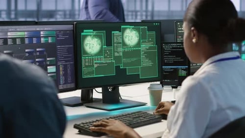 Programmers Work at Computers, System Hacked Warning