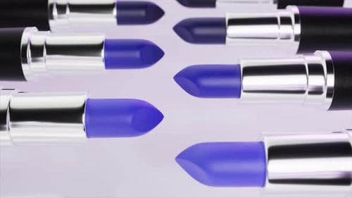 Rotierende blaue Lippenstifte drehen sich auf weißem Hintergrund und haben ein elegantes silbernes und schwarzes Gehäuse