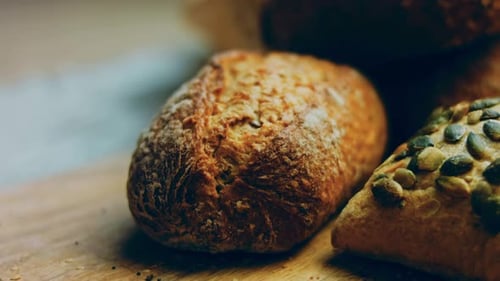 Close Up of Delicious Rolls on Wood Board