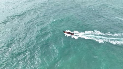 Aerial view of speedboat on the open ocean - 4K Drone video