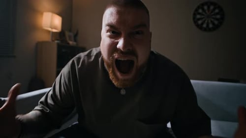 Man Expressing Rage and Stress in Close Up
