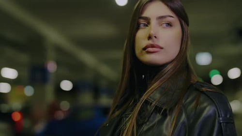 Stylish Woman with Leather Jacket in Urban Setting