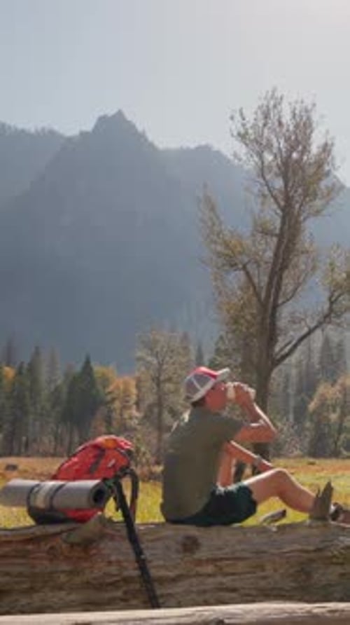 A Hiker Deeply Enjoying the Beautiful Serenity of Yosemite National Park and Nature
