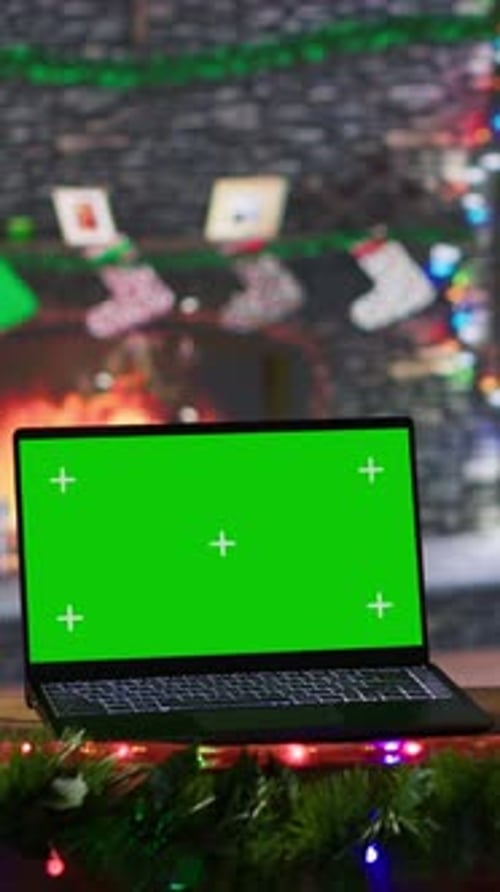 Vertical Video Father Christmas Reading Letters From Children Next to Green Screen Display