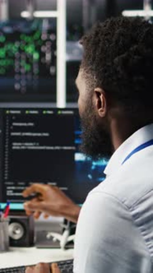 Vertical Video Server Farm Computer Scientist Interprets AI Generated Data Analytics Graphs