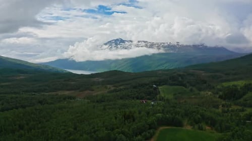 Aerial drone over the green majestic landscape in the Lofoten Islands, Norway.