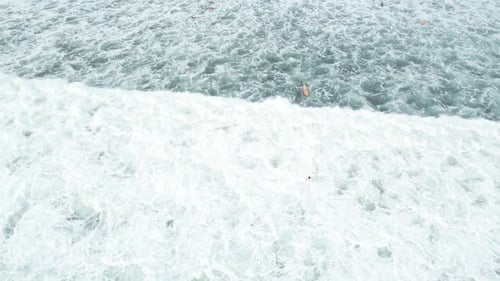 Surfers in Bali - Indonesia.