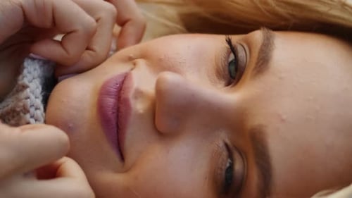 Close Up of a Blonde Woman Lying Down