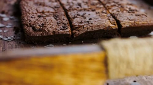 Delicious Brownies with Chocolate Sprinkles on Board