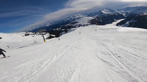 Man snowboarder POV riding in alps AD