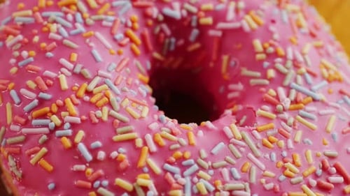 Donuts with Colorful Sprinkles Close Up Pink Sweets Macro