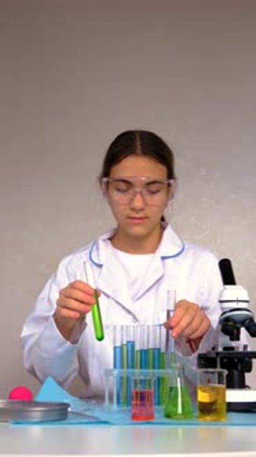 Young Adult Scientist Conducting Science Experiment in Lab