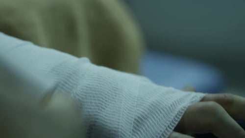 Bandage Being Wrapped on Hand Close Up