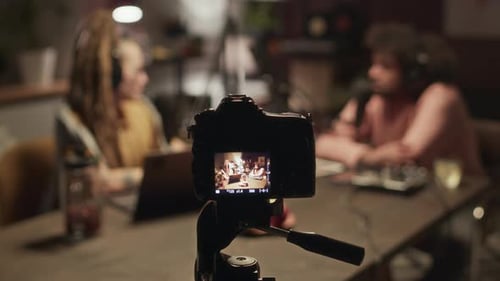 Two People Recording Audio in Studio