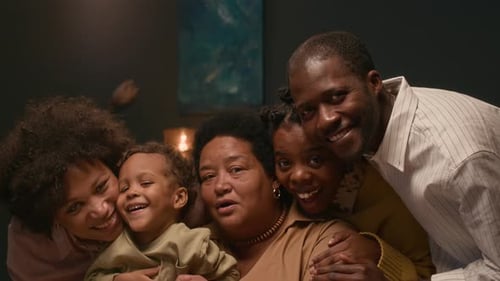 Happy Family Posing Together in a Cozy Home