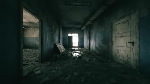 Abandoned Corridor in a Dilapidated Building with Natural Light Streaming in