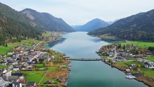 Aerial view of serene lake and village, Austria.