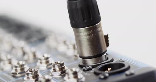 Connecting Cable Plugs Into an Audio Mixer