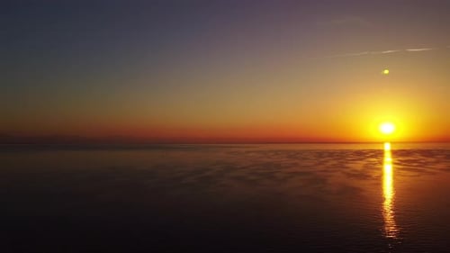 Aerial view of colorful sunrise over the sea, Kemer, Turkish beach resort city