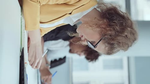 Vertical Screen Businesswoman Using Laptop in Coworking Space